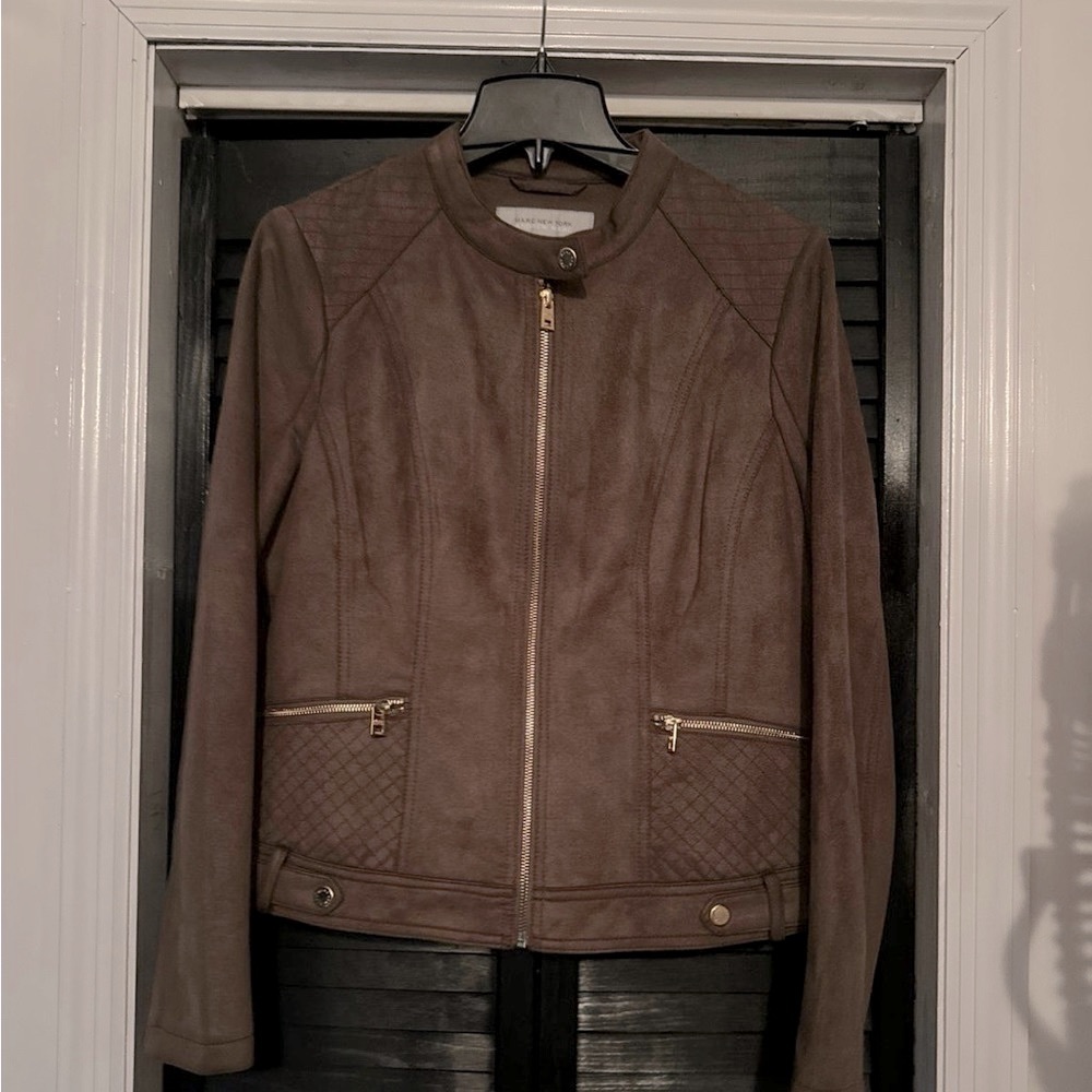 Marc New York suede jacket with gold accents and zippers. It is brown